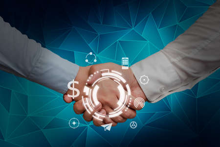 Hands shaking presenting innovative plan ideas symbolizing successful teamwork. Greeting palms...