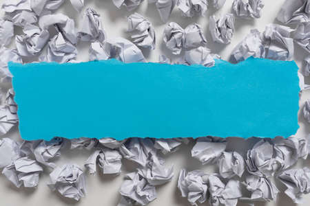 Paper Wraps Placed Under Important Informations. Wrinkled Notes Arranged Underneath Crutial Announcements. Crumpled Memos With Critical Data. Presented Recent Ideas.の写真素材