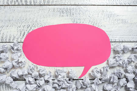 Speech Bubble On Floor With Important Information Written In With Paper Wraps Underneath. Dialogue...