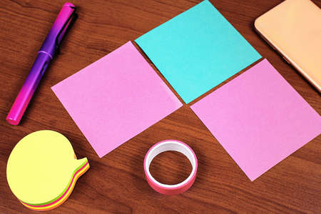 Important Informations Written On Three Different Notes On Desk With Cellphone And Tape. Crutial...
