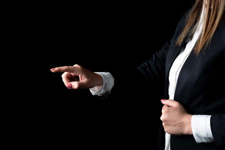 Businesswoman Pointing Important Infortmations With One Finger. Hand Presenting Crutial...