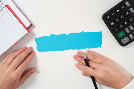 Businesswoman Holding Pen And Presenting Important Message On Paper. Woman Showing Crutial...