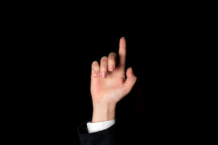 Businesswoman Pointing Important Infortmations With One Finger. Hand Presenting Crutial Announcement. Woman Showing Recent Updates. Executive Displaying Critical Messages.の写真素材