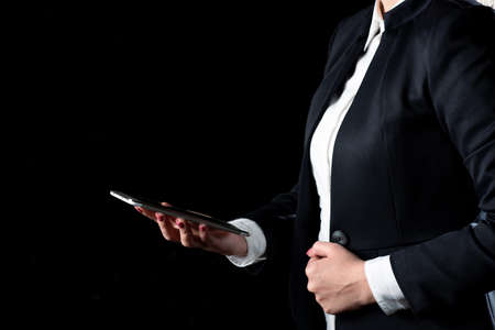Businesswoman Holding Tablet And Presenting Important Message. Woman Having Phone In Hands And...