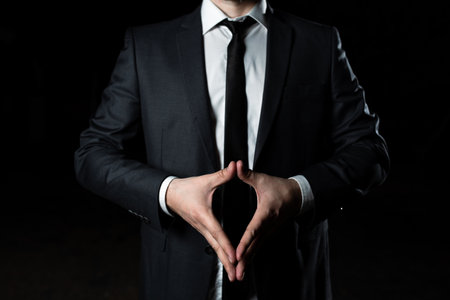 Businessman Presenting New Important Updates. Man In Suit Showing Recent Critical Announcements. Executive Displaying Crutial Informations. Manager Reasoning Relevant Ideas.の写真素材