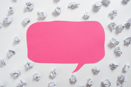 Paper Wraps Placed Around Speech Bubble With Important Information. Wrinkled Notes Arranged All Over Dialogue Ballon With Crutial Message. Crumpled Memos With Critical Data Inの写真素材