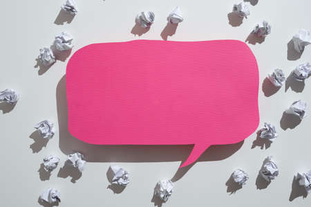 Paper Wraps Placed Around Speech Bubble With Important Information. Wrinkled Notes Arranged All Over Dialogue Ballon With Crutial Message. Crumpled Memos With Critical Data Inの写真素材