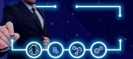 Businessman With A Pen Pointing On Glowing Digital Symbols In Row With A Futuristic Frame. Man In A...