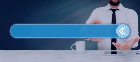 Businessman Holding A Tablet And Projecting A Camera In A Graphic Hexagone Design. Man In A Necktie...