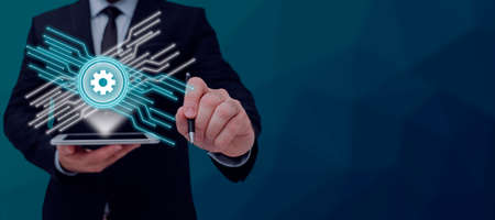 Businessman Holding Tablet With Graphs And Pen Which Points On Crutial Informations. Man In Suit...