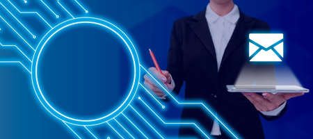 Businesswoman Holding A Tablet With A Message And Pointing A Pen On Glowing Lines. Woman With A...