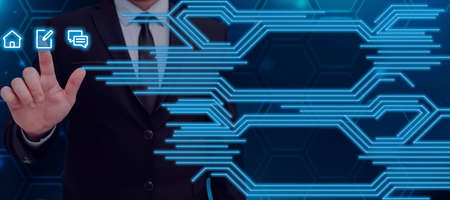 Businessman Pressing On Digital S And Displaying Crucial Information With Glowing Lines In...