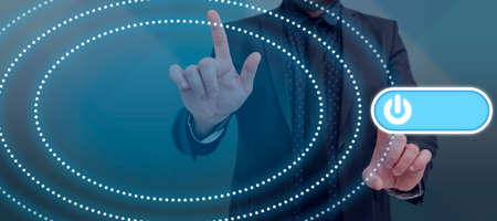 Businessman Pointing With Two Fingers On Circular Patterns With Power Button And Presenting...