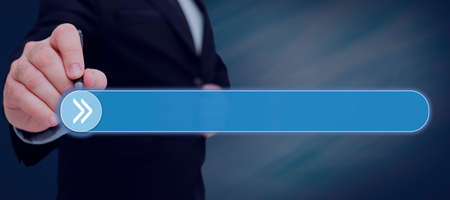 Businessman Holding A Tablet And Projecting A Camera In A Graphic Hexagone Design. Man In A Necktie Presenting Creative Photography And Digital Information.の写真素材