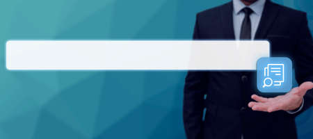 Businessman Presenting The Document Search Bar In Abstract Design. Man In Suit With One Hand Displaying The Search Looking For Important Files And Data.の写真素材