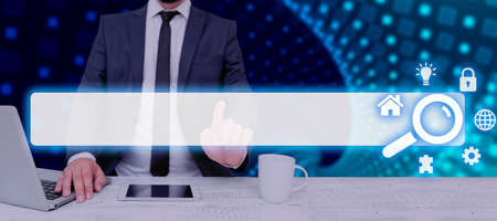 Businessman With Laptop And Tablet Pointing On Digital Symbols And Search Bar Looking For...