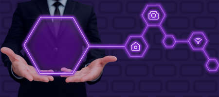 Businessman Holding Futuristic Design Over Hands And Showing Crutial Announcements. Man In Suit...