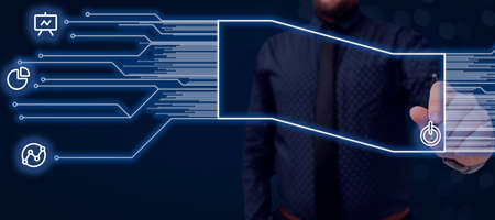 Businessman Holding Pen And Pointing On Power Sign Inside Futuristic Frame With Symbols Around. Man...