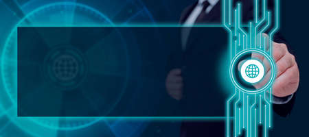 Businessman With A Pen And Pointing On A Globe With Glowing Lines And Abstract Frame. Man In A Suit...