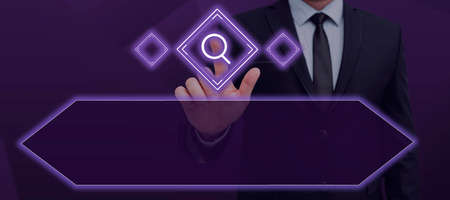 Businessman Pointing A Finger On The Search Bar And Exploring Business Strategies And New Ideas. Man In A Suit Looking For Innovative Marketing Solutions.の写真素材