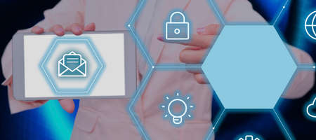 Businessman Pointing On A Tablet With Digital Symbols And Mail Envelope In A Futuristic Hive...