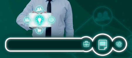 Businessman Holding Smartphone Showing Digitally Generated Multiple S And Symbols. Man Wearing...
