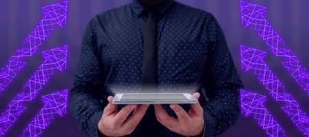 Businessman Holding A Tablet With Two Hands And Holding Information With Arrow Design Going Up. Man...