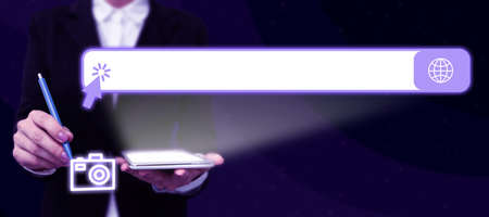 Businessman in suit holding tablet symbolizing successful teamwork accomplishing newest project plans. Man carrying electrical device representing combined effort management.の写真素材