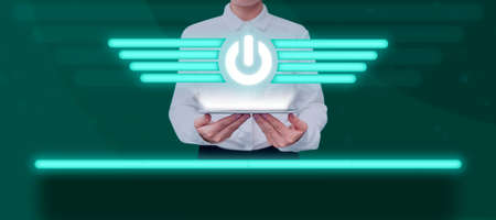 Female Professional Holding Tablet Displaying Futuristic Power Button With Bar Graph Above Line. Woman Presenting Modern Technology And Sharing Important Strategies.の写真素材