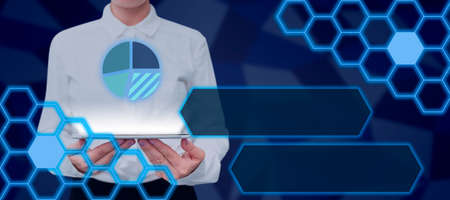 Businesswoman Holding Tablet Showing Graphical Pie Chart By Futuristic Designs Presenting Business...