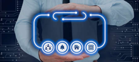 Businessman Having Futuristic Frame With Digital Display Of Symbols In Hands . Man In A Necktie...