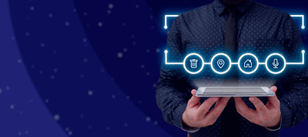 Businessman Holding A Tablet Projecting Glowing Digital Symbols In A Row With A Futuristic Design....