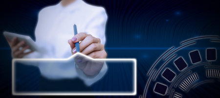 Lady in suit holding pen symbolizing successful teamwork accomplishing newest project plans. Woman carrying ballpoint pencil representing combined effort management.の写真素材