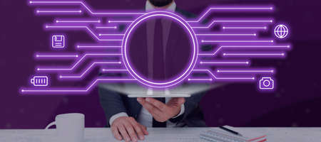 Businessman Holding A Tablet With Crucial Information And Digital S In A Futuristic Design With...