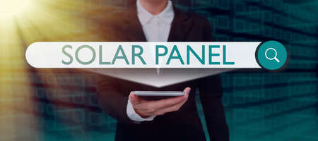Writing displaying text Solar Panel. Conceptual photo designed to absorb suns rays source of energy generating Businessman in suit holding notepad symbolizing successful teamwork.の写真素材