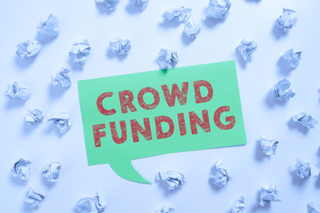 Sign displaying Crowd Funding. Business approach Fundraising Kickstarter Startup Pledge Platform Donations Paper Wraps Placed Around Speech Bubble With Important Information.の写真素材
