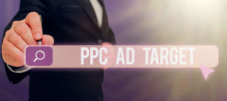 Text sign showing Ppc Ad Target. Business approach Pay per click advertising marketing strategies online campaign Man Holding A Tablet Projecting A Camera Showing Creative Photography.の写真素材