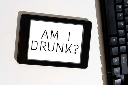 Text caption presenting Am I Drunk. Word Written on Doubtful if my alcohol levels are high addiction...