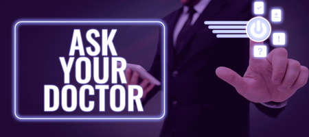 Text sign showing Ask Your Doctor. Conceptual photo Consultation to medical expert about state of health Lady in suit holding pen symbolizing successful teamwork accomplishments.の写真素材