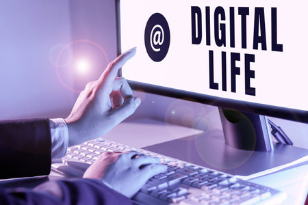 Inspiration showing sign Digital Life. Business overview Living in a world interconnected through Internet Multimedia Woman Typing Updates On Lap Top And Pointing New Ideas With One Finger.の写真素材