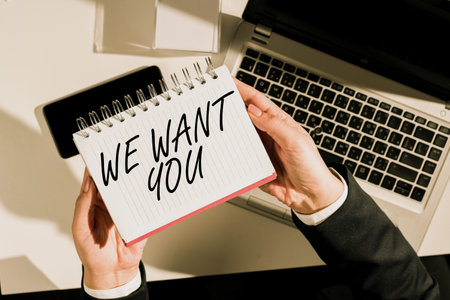Text showing inspiration We Want You. Business idea Company wants to hire Vacancy Looking for talents Job employment Businesswoman Holding Notebook Over Desk With Notes, Cellphone And Lap Top.の写真素材
