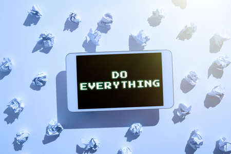 Inspiration showing sign Do Everything. Business showcase Jack of All Trades Self Esteem Ego Pride No Limits Paper Wraps Placed Around Tablet With Important Informations.の写真素材
