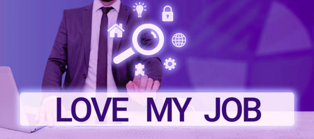 Sign displaying Love My Job. Business approach To be pleased with the work that one does being comfortable Man With Laptop And Tablet Pointing On S Searching For Data And Ideas.の写真素材