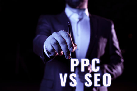 Text showing inspiration Ppc Vs Seo. Business concept Pay per click against Search Engine Optimization strategies Businessman Pointing Important Informations With Pen In Hand.の写真素材
