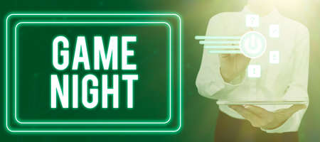 Sign displaying Game Night. Word for event in which folks get together for the purpose of getting laid Lady in suit holding pen symbolizing successful teamwork accomplishments.の写真素材