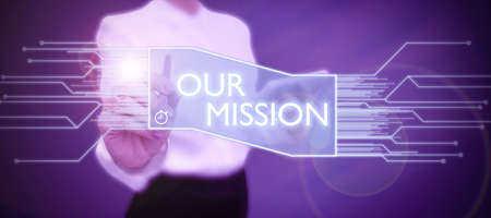 Writing displaying text Our Mission. Word Written on tasks or schedule we need to made them right in order success Businessman in suit holding notepad symbolizing successful teamwork.の写真素材