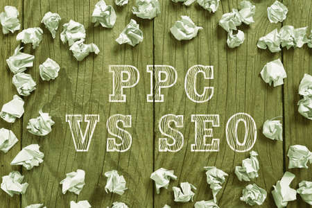 Writing displaying text Ppc Vs Seo. Business approach Pay per click against Search Engine Optimization strategies Paper Wraps Arranged In Circle With Crutial Announcement Inside.の写真素材