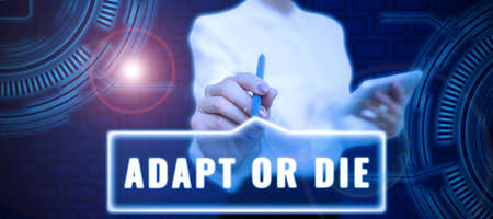 Handwriting text Adapt Or Die. Business approach Be flexible to changes to continue operating your business Businessman in suit holding notepad symbolizing successful teamwork.の写真素材