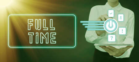 Text showing inspiration Full Time. Business showcase working or operating the customary number of hours in a day Woman Sitting On Desk Working And Presenting New Technologies.の写真素材