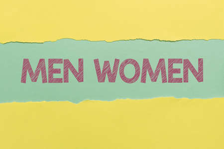 Hand writing sign Men Women. Business concept The state where in a boy or a girl turns to be a mature adult -47901の写真素材